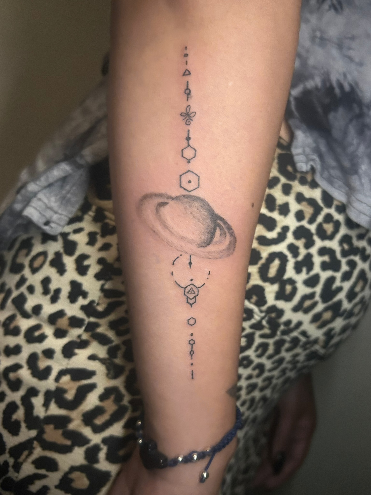 Planetary and geometric composition along the forearm