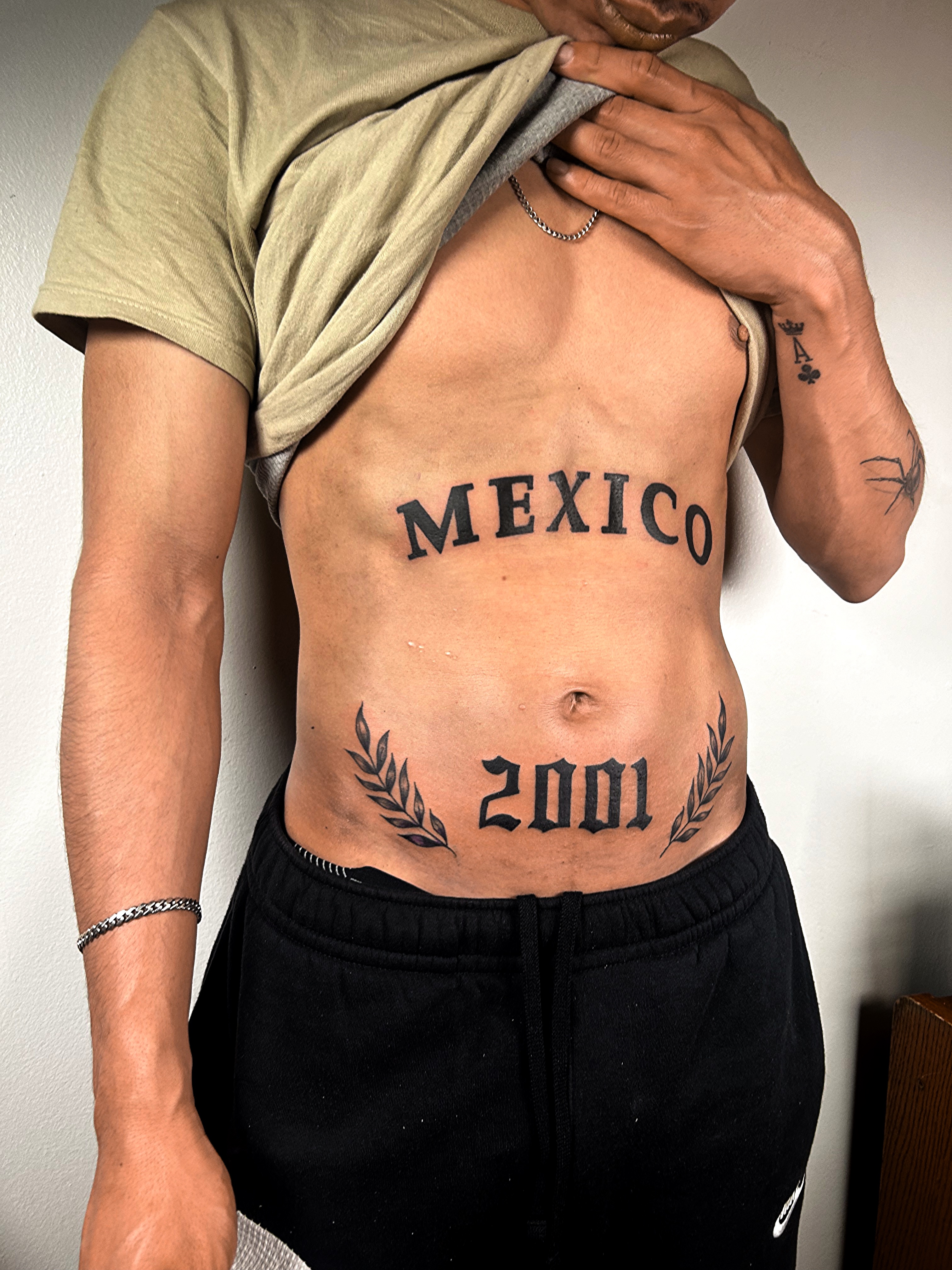 Mexico and 2001 typographic composition across the torso